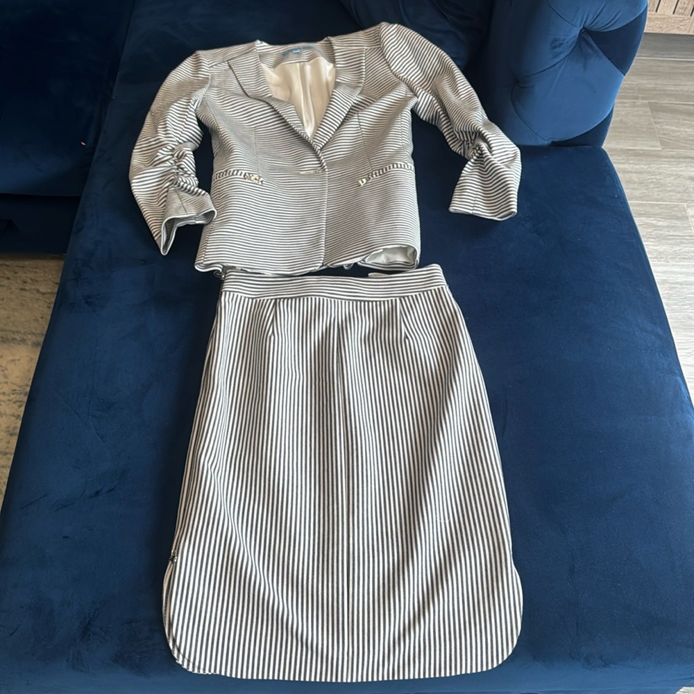 Professional Antonio Melani jacket and skirt.